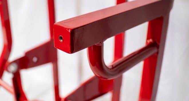 Red coated bent tube cart frame